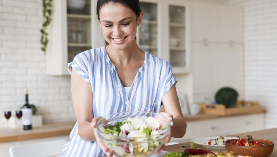 medium-shot-smiley-woman-holding-bowl Traditional food processing